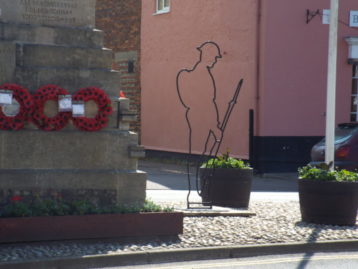 Tommy Military Figure in Holt, next to War Memorial